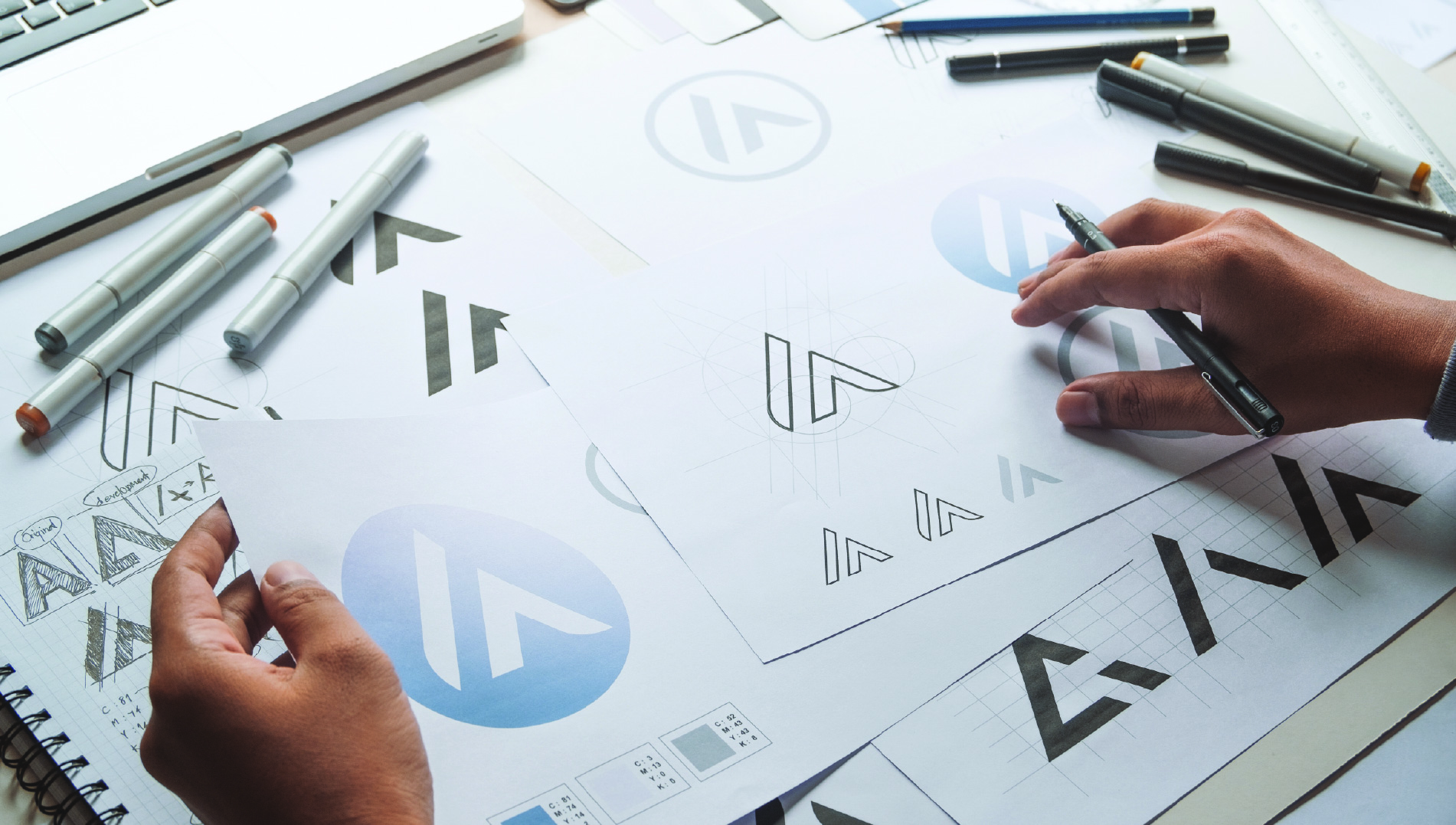 designer illustrating logo design